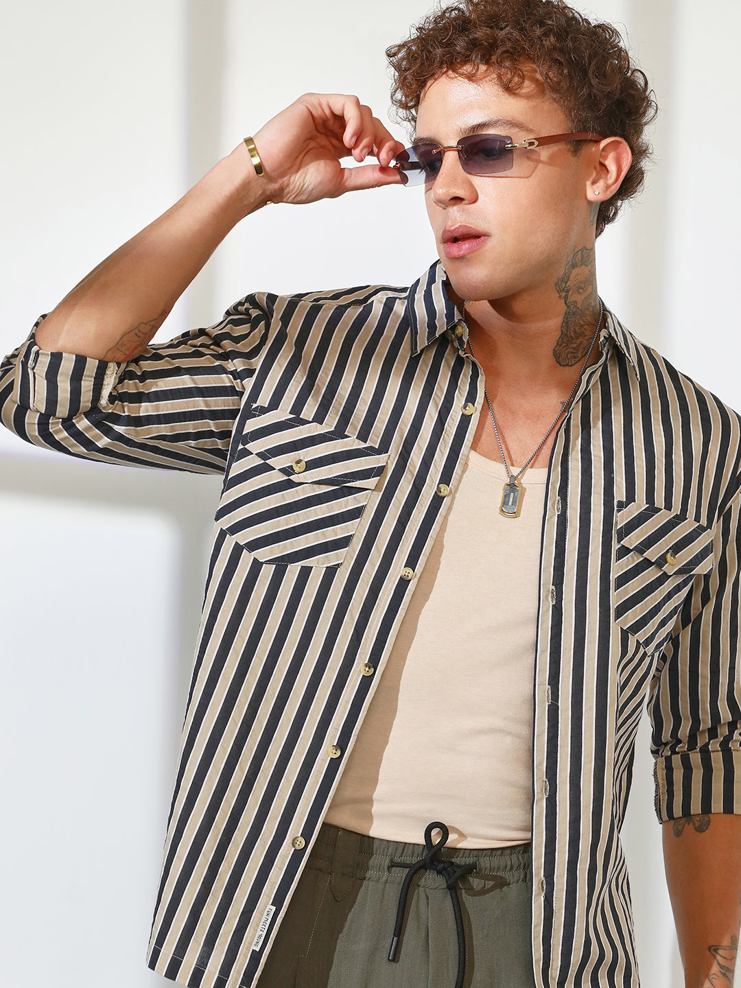 ₹899 | Campus Sutra men's Navy Blue & Khaki Beige Candy Striped