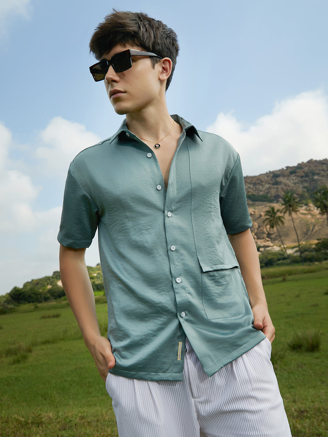 999 | Campus Sutra mens Sage Green Solid Flap Oversized Shirt - Campussutra 999 | Campus Sutra mens Sage Green Solid Flap Oversized Shirt - Campussutra