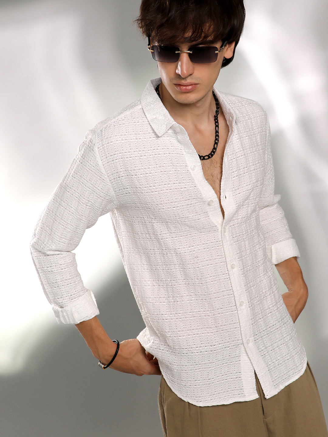 ₹899 | Campus Sutra men's Cream White Solid Textured Knit Shirt