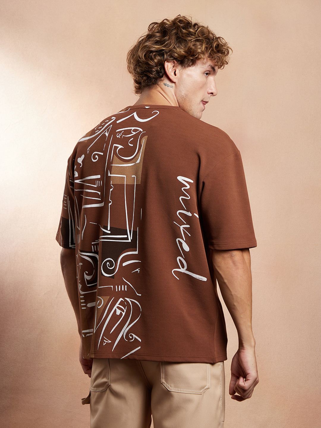 ₹849 | Campus Sutra Men's Mocha Brown Boxy Folk-Wave T-Shirt