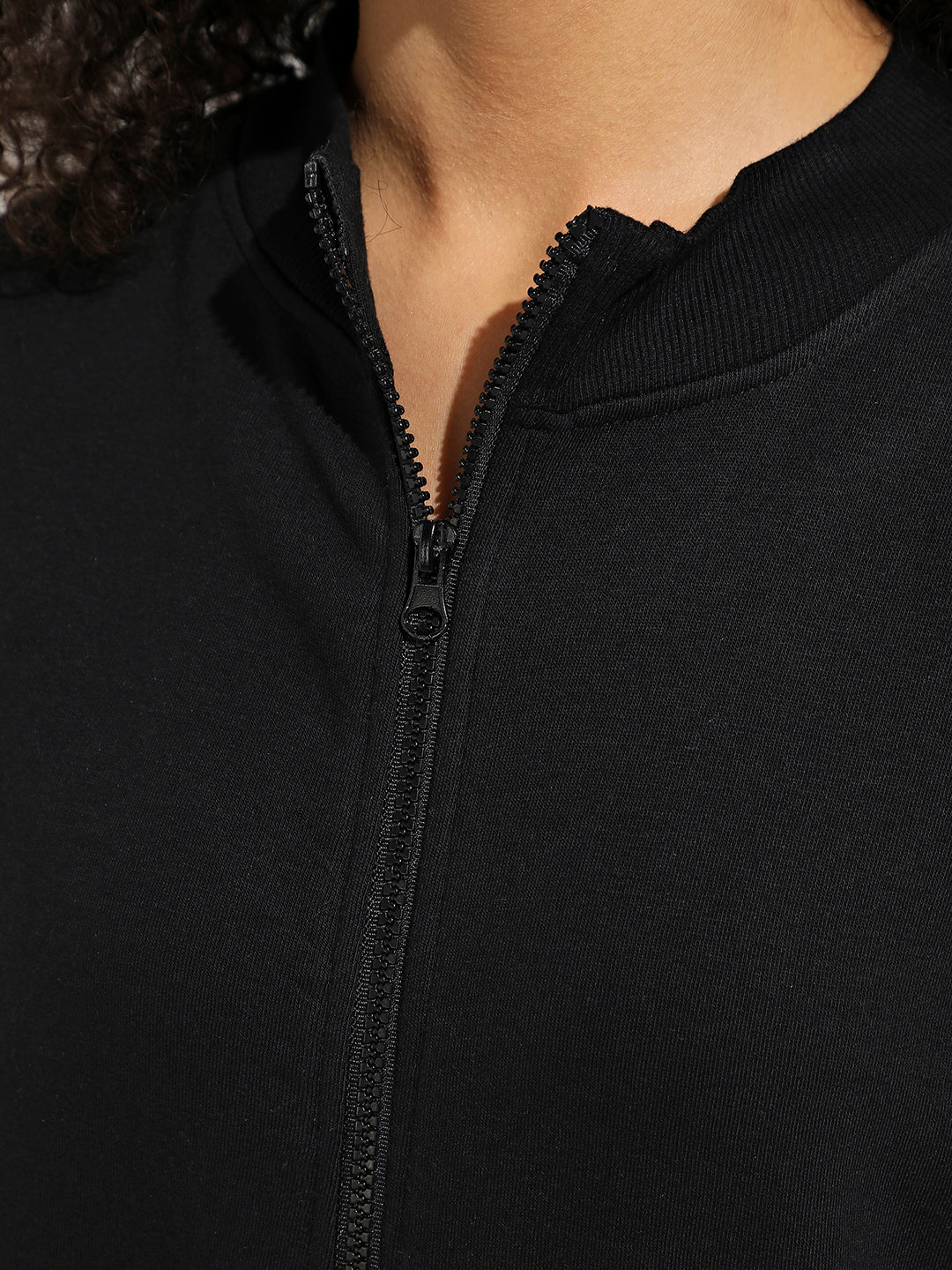 Black Zip-Front Sweatshirt With Polka Dot Sleeve