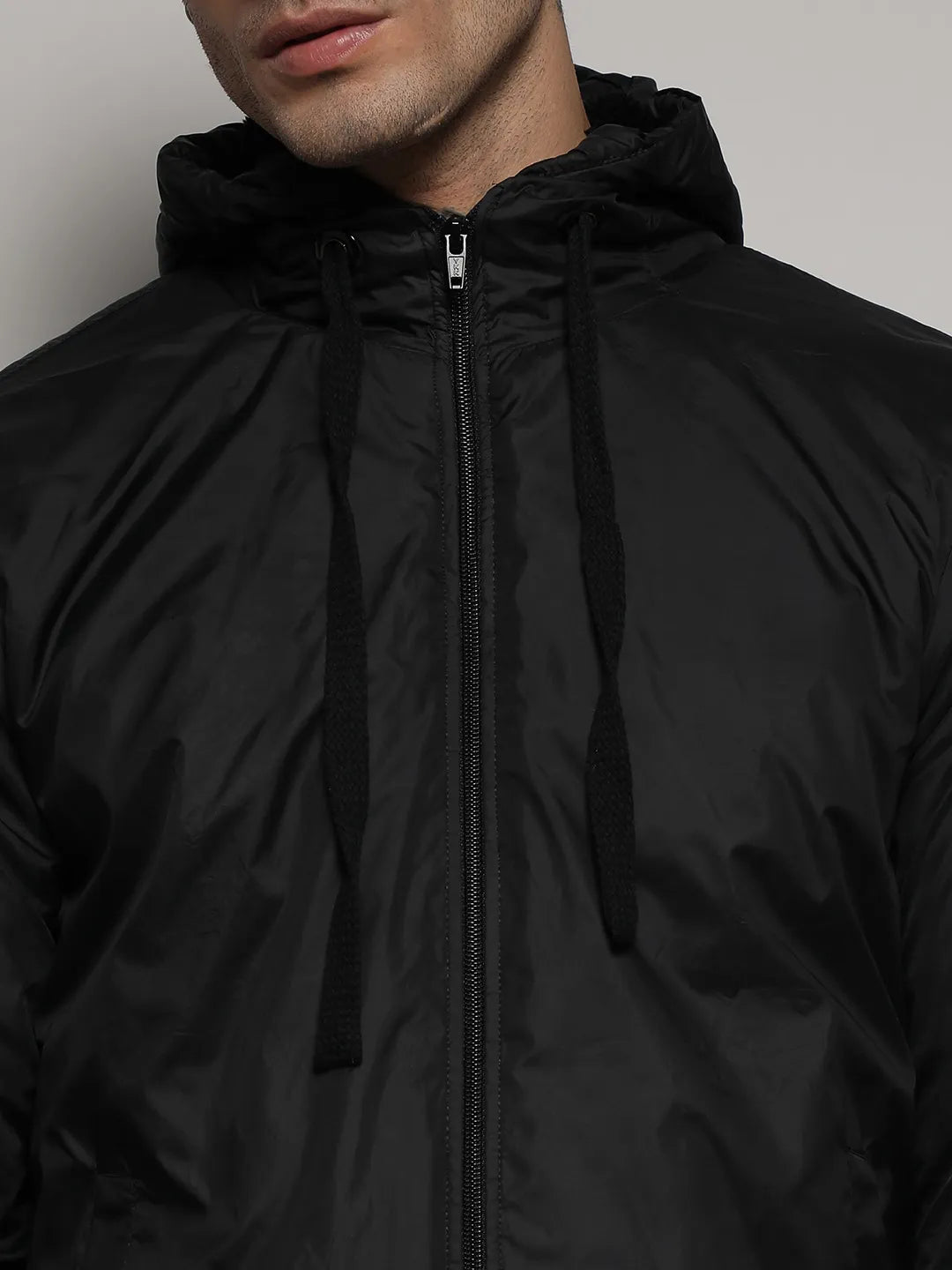 Black Zip-Front Jacket With Ribbed Hem