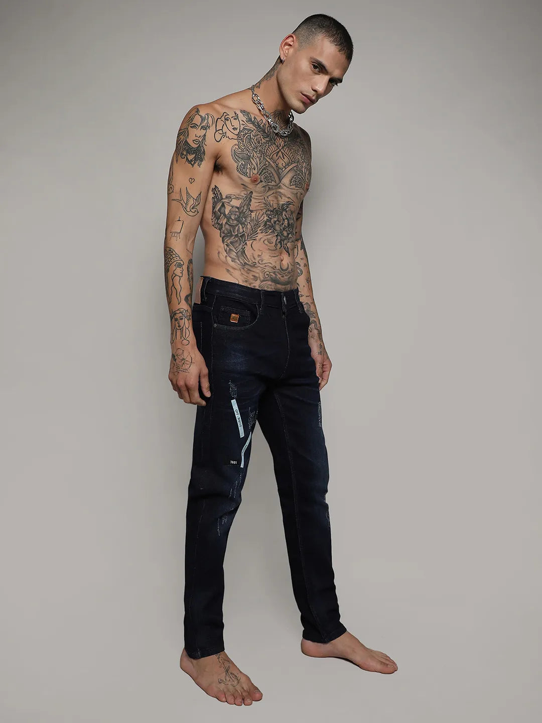 Distressed Denim Jeans With Embroidered Details